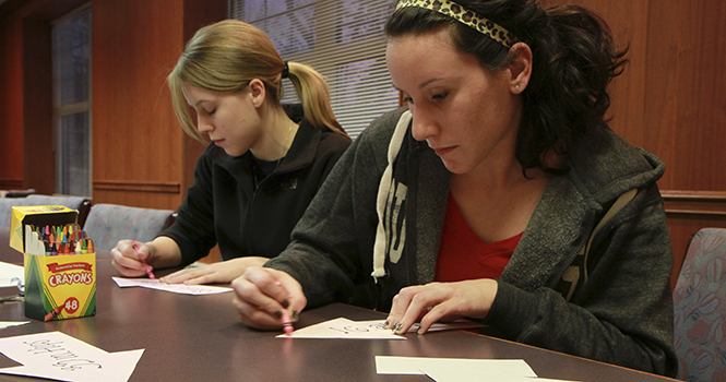 Elizabeth James, a graduate student in public health, joins Body Acceptance movement to help Colleen Fitzgibbons, president of the group, with a practicum project. Photo by YOLANDA LI.