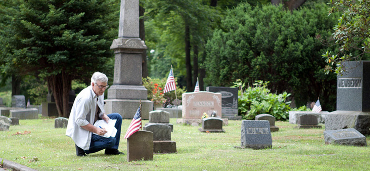 Fred Endres does research at Standing Rock Cemetery for the documentary, “The ‘Sojer Boys’ of Portage County. Photo by Tom Song. Photo courtest of Fred Endres