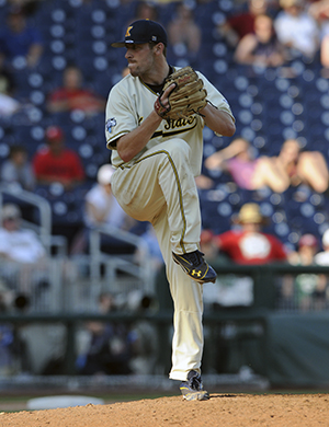 Michael Clark pitches a strike during Monday’svictory against number one ranked Florida.Photo by Philip Botta.