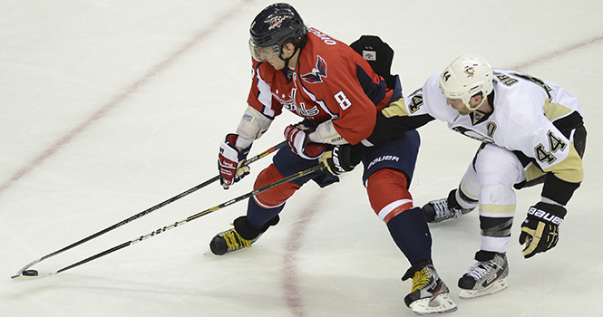 Washington Capitals left wing Alex Ovechkin (8) carries the puck against Pittsburgh Penguins defenseman Brooks Orpik (44) in the third period at the Verizon Center in Washington, D.C., Sunday, February 3, 2013. The Penguins defeated the Capitals, 6-3. Photo by Chuck Myers/MCT.