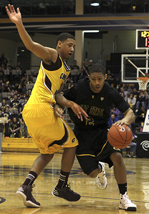 Freshman guard Kellon Thomas drives past his Central Michigan opponent during an 87-72 home victory Saturday, Feb. 9. Photo by Shane Flanigan.