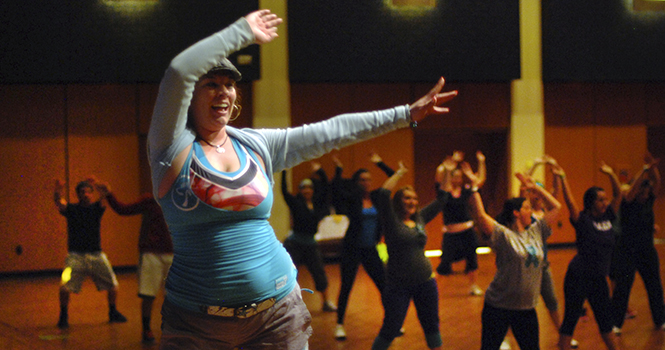 Sue Salem, a zumba instructor from Green, Ohio, leads the first Zumbathon at Kent State University on Friday, February 22, 2013. The event raised money to benefit MDA's Augie's Quest to Cure ALS, also known as Lou Gehrig's disease. Photo by MELANIE NESTERUK.