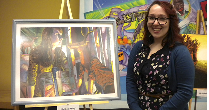 Nicole Perry with her winning painting "New Chair." Photo courtesy of Kelsey Leyva.