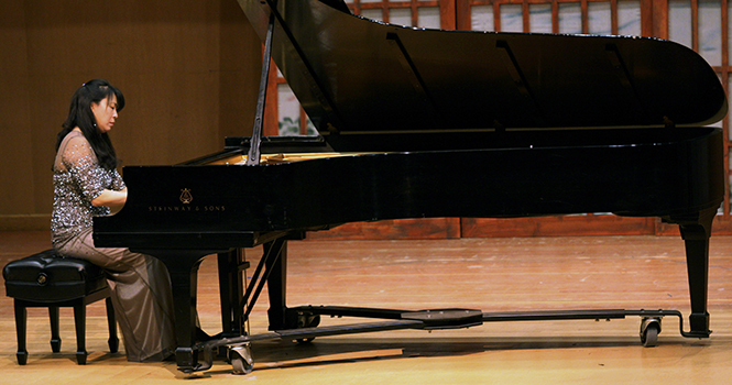 Pianist Marian Lee performed at the Kent Keyboard series with her compilation "Religion and Passion," which included works by Bach, Crumb, Ustyolskaya, Beethoven, and Debussy in Ludwig Hall, on Sunday March 10th, 2013. Photo by Emily Lambillotte.