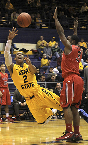 Freshman guard Kellon Thomas attempts a shot while falling to the court during Kent State's 73-71 College Insider Tournament win over Fairfield on Wednesday, March 20 at the MACC. Photo by Shane Flanigan.