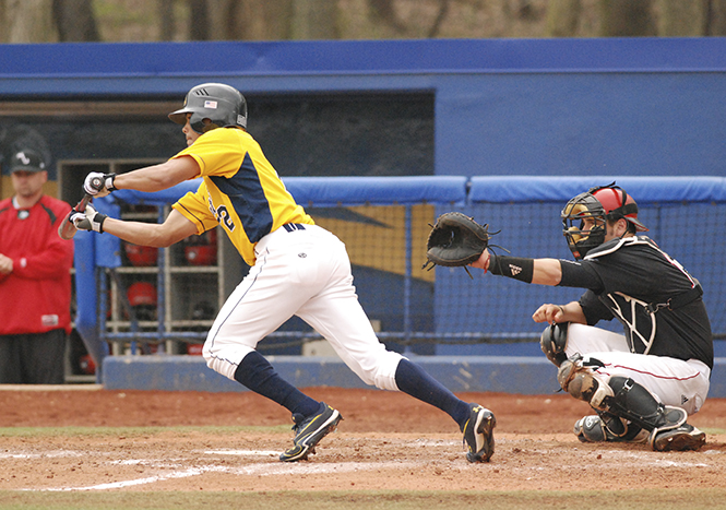 Junior infielder Derek Toadvine bunts against Northern Illinois on March 25, 2012. Photo by Grace Jelinek.