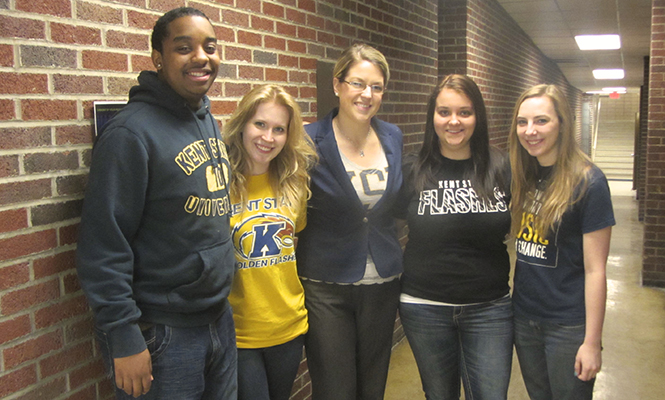 Public relations students Wezley Garlick, Caitlin Potts, Mary Kate Garvey and Lindsey Sager and Kirsten Bowers pose for a group photo while volunteering at Rootstown Middle School. The group helped raise awareness of bullying in the school and taught students how to stop it. Photo courtesy of Caitlin Potts.