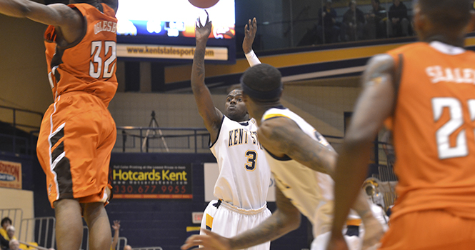 Randal Holt shoots the ball against the Bowling Green defense on Sunday, Jan. 13, 2012. The Flashes came out with a victory against Bowling Green at the M.A.C. Center. 92-87. Photo by EMILY MARTIN.