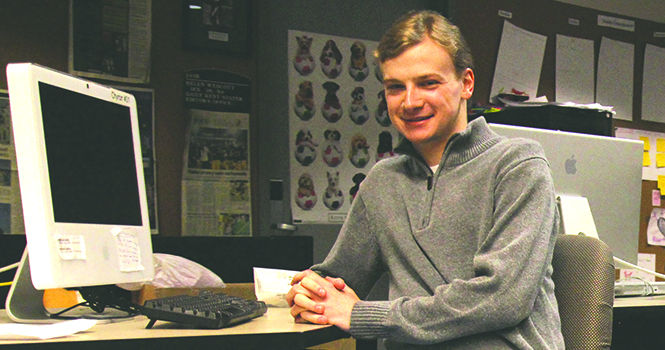 Freshman Broadcast Journalism major Bobby Carroll, 19, is working with university officials to create a Meteorology major here at Kent State University. Bobby broadcasts his own weather forecasts online and works behind the scenes for TV2. Photo by ADRIANNE BASTAS.