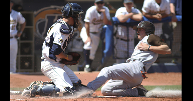 Bowling Green's T.J. Losby is thrown out at home plate by Tommy Monnot during Kent State's 3-1 victory on Saturday, April 27, 2013 at Schoonover Stadium. Photo by Shane Flanigan.