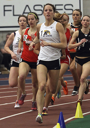 Junior distance runner Paige Foster runs in the women's mile during the Kent State Tune Up track and field meet in the field house on Saturday, Feb. 16, 2013. Foster placed 11th with a 5:22.54 . Photo by Matt Hafley.