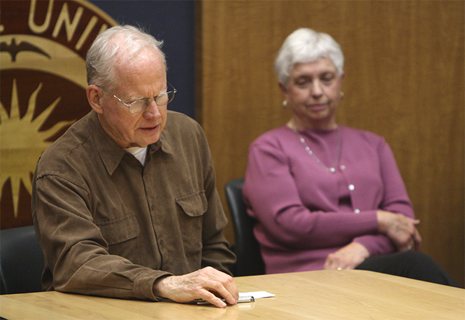 A guest speaks as PRIDE! Kent members host the Akron PFLAG Club in the Governance chambers Thursday night, April 25, 2013, discussing what it is like to be a supportive parent to an openly gay family member. Photo by Emily Lambillotte.