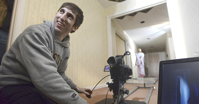 Director of Photography Matt Petrunak, a junior electronic media major, is all smiles while shooting the teaser for "Hell at Heathridge."PHOTO COURTSEY OF HELL AT HEATHRIDGE.