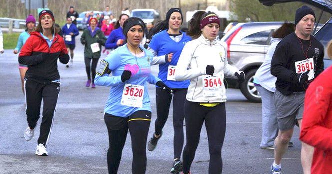 Runners participate in the On My Own Two Feet Marathon on Saturday April 20, 2013. The run was a fundraiser that supported local survivors of domestic violence. Photo courtesy of Andrea Whaley.