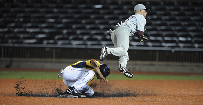 Junior infielder Derek Toadvine slides to second base against Central Michigan on May 22, 2013. Kent beat Central Michigan 15-8 but was eliminated from the Mid-American Conference Tournament on May 25 after falling 4-1 to Ball State. Photo by Matt Hafley.