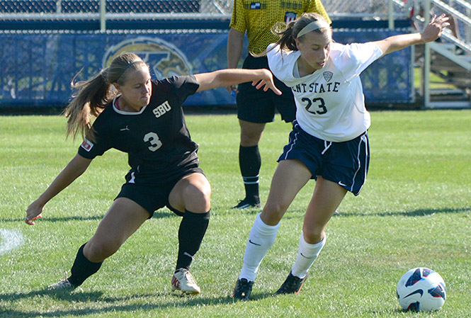 Kent State freshman Jenna Hellstrom (right) defends the ball against St. Bonaventure's Molly Curry (left) during their winning game, with a final score of 3-2, Friday, August 23, 2013. Photo by Leah Klafczynski.