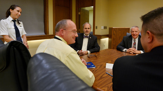 Kent State Provost Diacon met with officials from CommutAir to sign a contract agreement to hire graduate students from Kent State University's Aeronautics Division to work at places like Cleveland Airport and United Airways. Photo by Jacob Byk