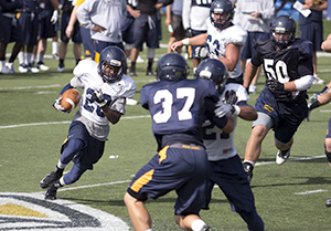 The Kent State Golden Flashes practice Aug. 16 at Dix Stadium for the upcoming 2013 season. Photo by COTY GIANNELLI.