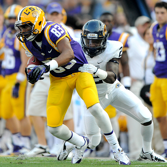 LSU freshman wide receiver Travin Dural (83) escapes a Kent State player Saturday, September 14, 2013 in the Tigers' 45-13 victory against Kent State. Photo by Angela Major/The Daily Reveile.