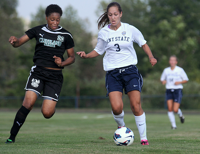 Junior forward Stephanie Haugh (right) defends the ball from Clevelands State's Lynsay Strahorn (left) Friday, August 30, 2013. The flashes defeated Cleveland State 1-0. Photo by Rachael Le Goubin.