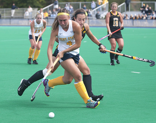 Hannah Faulkner blocks the puck from an Iowa opponent on Sunday, Sept. 22, 2013. Kent State lost to Iowa 0 to 6. Photo by Brianna Neal.