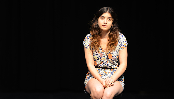 Isabella Trevino performs as a bachlorette in "The Dating Game" skit in the blackbox theater at the Music and Speech building on October 14, 2013. Photo by Leah Klafcznyski