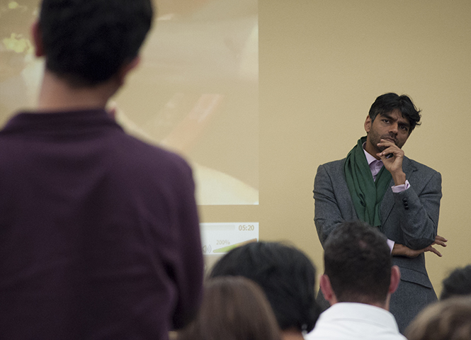 Raj Patel, global hunger crisis speaker, listens to a student's question on Tuesday Oct. 22, 2013. The presentation was part of the Guest of Honor University Lecture Series. Photo by Brianna Neal.