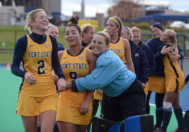 Junior goal keeper Jahna Jordan hugs senior midfielder Rebecca Lee after Kent beat Miami 3-1 on Saturday, Oct. 27, 2013 at Murphy-Mellis Field. Photo by Matt Hafley.