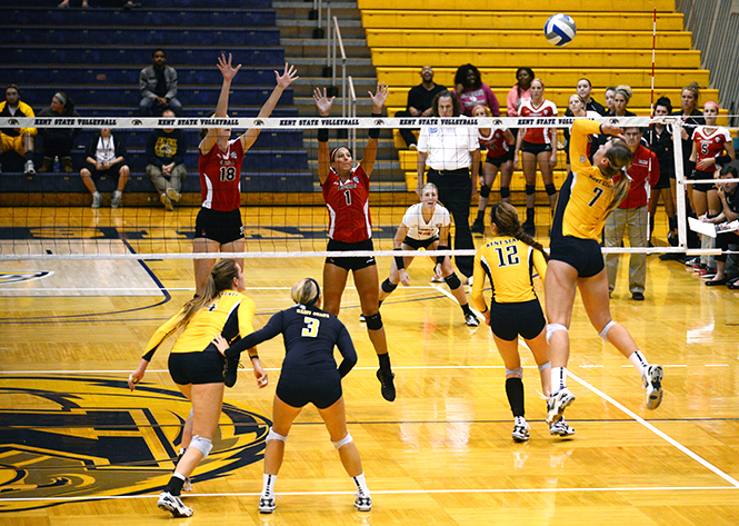 Sophomore Kelly Hutchison spikes the ball toward Ball State Friday, October 18. Photo by Leah Klafczynski.