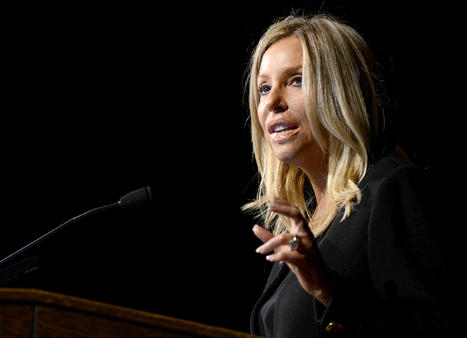 Lauren Manning, who was in the World Trade Center on September 11, 2001, shares her story with the Kent State students on October 15, 2013. "Good luck, bad luck and blind luck, I had all three that day," Manning reflected. "I could not breathe, I could not speak...I could do nothing." Photo by Melanie Nesteruk.