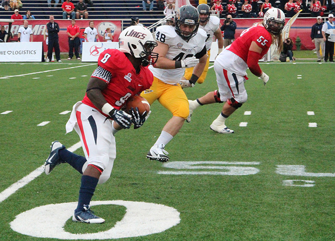 South Alabama's Jay Jones outskirts the Kent State defense during a Saturday Oct. 19, 2013, game in Mobile, Ala. The Flashes were defeated by the Jaguars 21-38. Photo courtesy of The Vanguard.