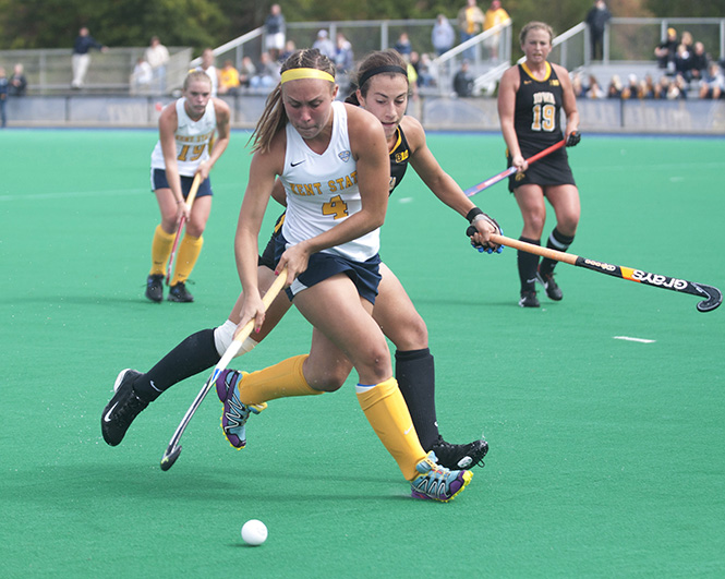 Golden Flash Hannah Faulkner blocks the puck from an Iowa opponent on Sunday Sept. 22, 2013. Kent State will go against the University of Miami this Sunday at home. Photo by Brianna Neal.