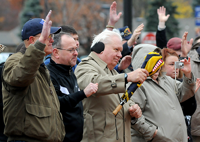 Veterans accept recognition for their service during Kent State's observation of Veteran's Day on Thursday, Nov. 7, 2013. Photo by Rachael Le Goubin.