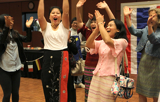 Team Thailand celebrates as they are announced as the winning team at the International Cook-Off on Thursday, Nov. 21, 2013 in the ballroom. Six teams cooked traditional food from India, Thailand, China, Sri Lanka, Iran and Japan. Photo by Rachael Le Goubin.