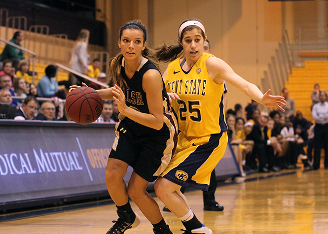 Guard Rachel Mendelsohn tries to steal the ball in the game against Walsh University in the M.A.C. Center on Wednesday, Nov. 6, 2013. Kent State women's basketball team loses the game to Walsh University 89-80. Photo by Yolanda Li.