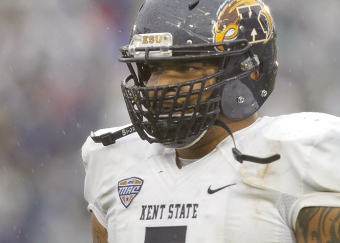 Kent State Defensive Line, Roosevelt Nix, returns to the sidelines during the game against Penn State at State College, Penn. On Saturday, September 21, 2013. Nix was named Mid-American Conference East Division Defensive Player of the Week. Melanie Nesteruk.