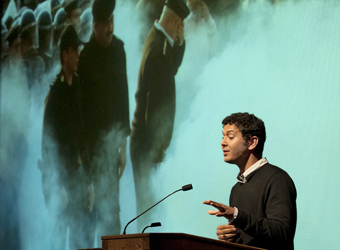 Sharif Abdel Kouddous, independent journalist and Democracy Now! correspondent, speaks to Kent State students about the political uprising in Egypt in the KIVA on Thursday, Nov. 7, 2013. Kouddous described the uprising as a revolution. "What's revolutionary is winning the streets," he said. Photo by Brianna Neal.