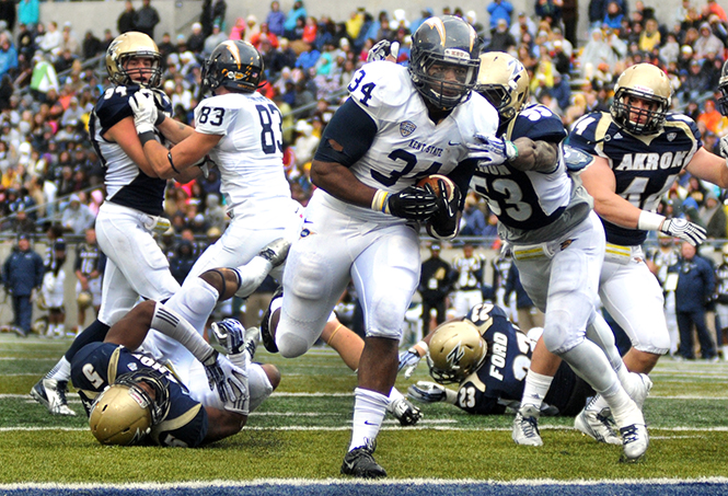 Junior running back Trayion Durham scores Kent State's only touchdown in the Wagon Wheel game against Akron on Saturday, Nov. 2, 2013. The Flashes lost to the Zips 16-7. Photo by Rachael Le Goubin.