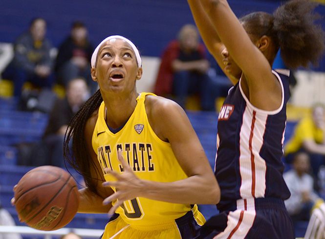 Junior Cici Shannon goes in for a lay up during the Flashes' game against Duquesne University on Nov. 14, 2013. Kent State lost the game 94-63. Photo by Melanie Nesteruk.