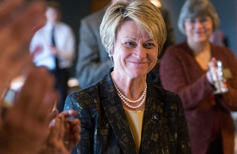 Kent State faculty and students give a round of applause for university president-elect Beverly Warren at a meet-and-greet held in the Schwebel Room at the Student Center on Wednesday, Jan. 8, 2014. Warren's presidency will take effect in July, replacing outgoing President Lester Lefton.