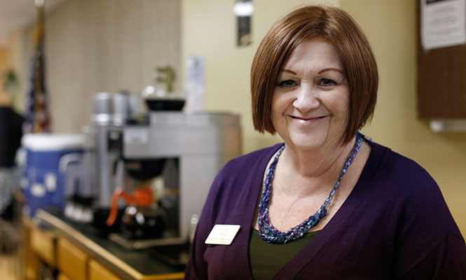 Anne Marie Mann-Noble, the Director of Emergency and Outreach Services for Family &amp; Community Services, stands by the kitchen for the community center in Ravenna on Wednesday, Jan. 29, 2013. The center is open 24 hours a day when the temperature reaches 10 degrees to accommodate the homeless.