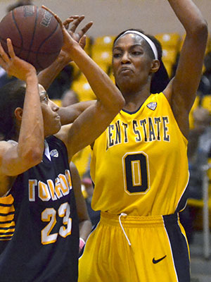 Redshirt junior center CiCi Shannon attempts to block in a game against Toledo on Sunday, Feb. 9, 2014. Shannon scored a personal record high, but Kent State ended up losing the game 83-55.