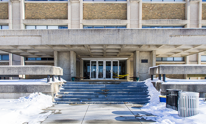 The entrance of Williams Hall is showing signs of wear and tear due to the building's age. Williams Hall was built in the late 1960s and has not been renovated since.