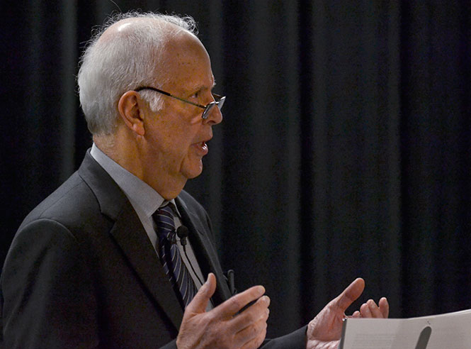 Author Parker J. Palmer speaks about democracy in the African Community Theatre at Oscar Ritchie Hall, Tuesday, Feb. 18, 2014.