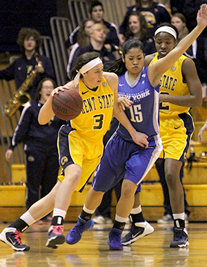 Kent State freshman Larissa Lurken drives the ball past Buffalo's Margeaux Gupilan against the Bulls, Wednesday, Feb. 19, 2014.