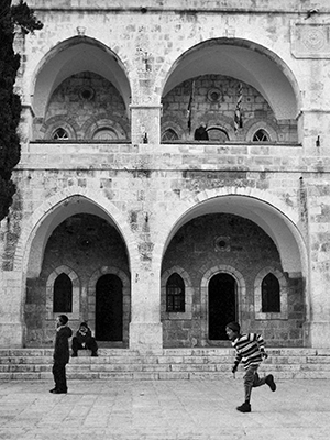 A young boy plays in the old quarter of Jerusalem, where only Hasidic Jews are aloud to dwell. This picture was taken while on the birth right trip to Israel hosted by Kent State Hillel.