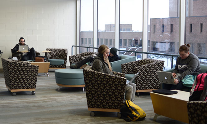 Students study in the newly renovated VCD wing on the MAC Annex Tuesday Feb. 10, 2014. The entire section used to be a pool, with the diving board loacted in the next door classroom.