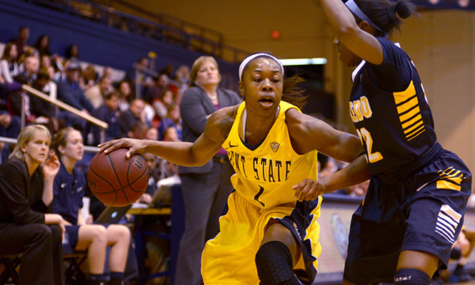 Senior guard Ashley Evans dribbles down the court during a game against Toledo Sunday Feb. 9, 2014. Kent State lost 55-83.