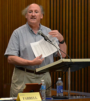 Chair of Faculty Senate Paul Farrell speaks at a faculty senate meeting held in the Governance Chambers, Oct. 7, 2013.