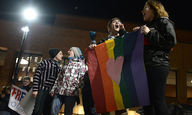 Kent State students participate in a rally in favor of LGBTQ rights in Risman Plaza Wednesday, Feb. 19, 2014. Students gathered in response to the Westboro Baptist Church's threats to picket Kent State that had been circulating on Twitter earlier in the day.